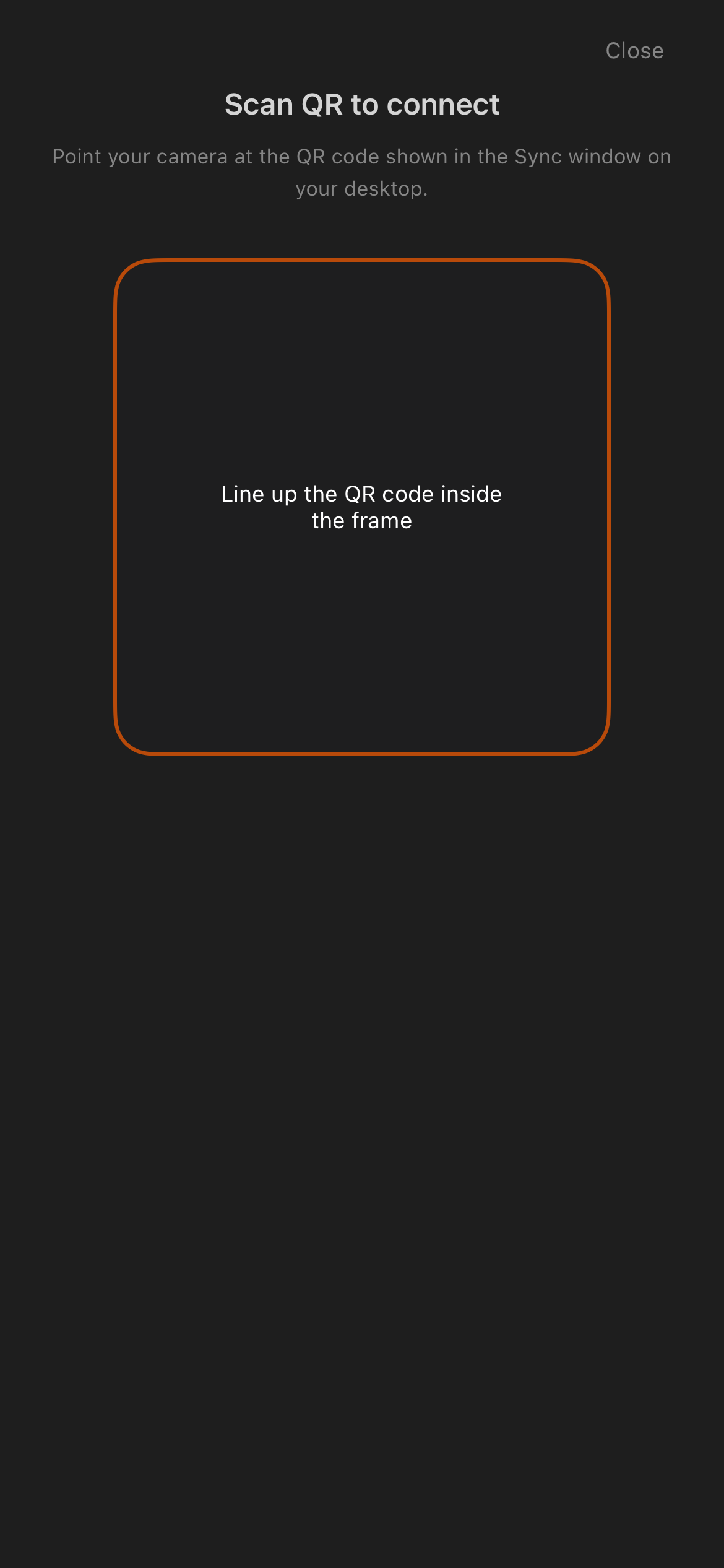 iOS QR pairing scanner with a large framed scan area and close control